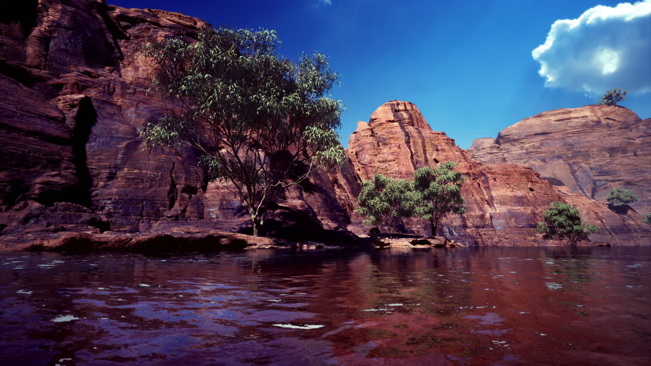 Majestic rock formations by serene waters under a vibrant blue sky