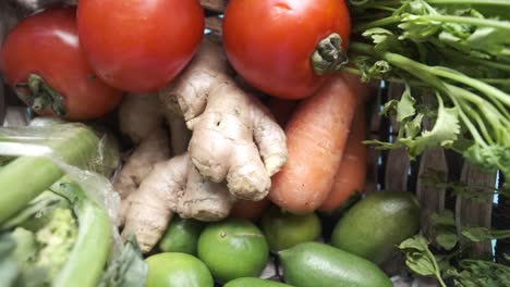 assorted fresh vegetables and fruits in a basket