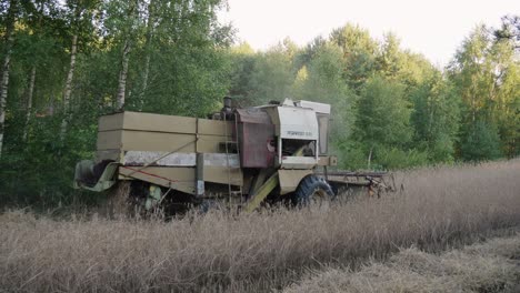 The-Tractor-Actively-Engaged-in-Mowing-Hay-in-Borowy-Młyn,-Poland---Wide-Shot