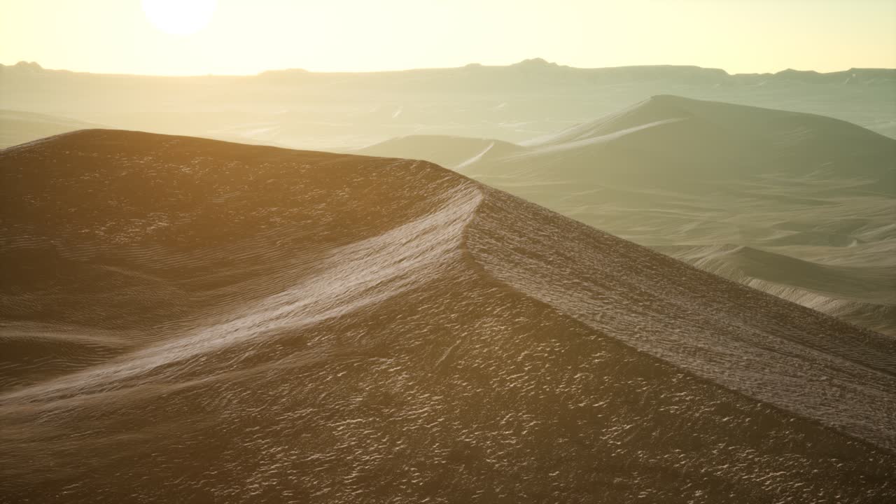 해가 뜨면 사하라 사막 의 큰 모래 언덕 에 대한 공중 전망