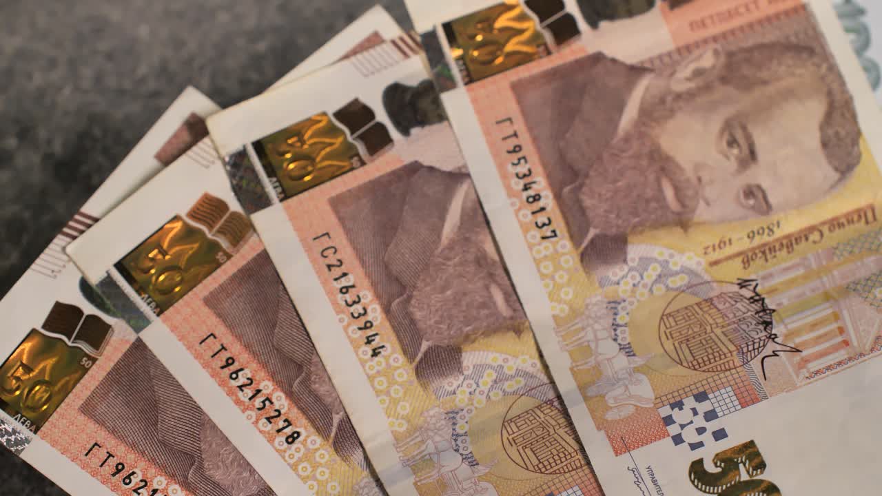 Bulgaria change currency, Bulgaria Lev to Euro. Money exchange. Paper banknotes on table. Concept, economy, competition, crisis, banking and finance. BGN,BGL. Scene K. Close up slide shot