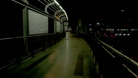 watching the cars on the victory monument in bangkok at night