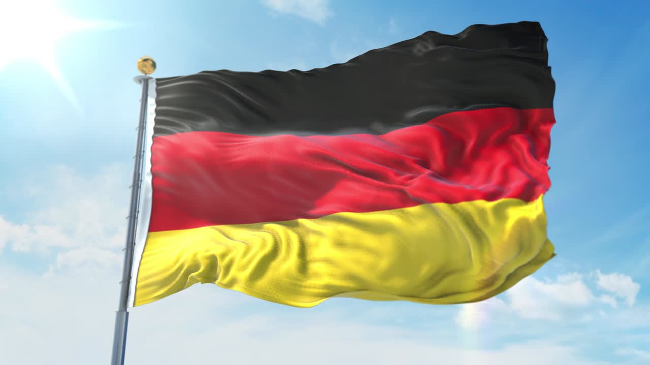 Germany flag waving in the wind against deep blue sky. National theme, international concept. 3D Render Seamless Loop 4K