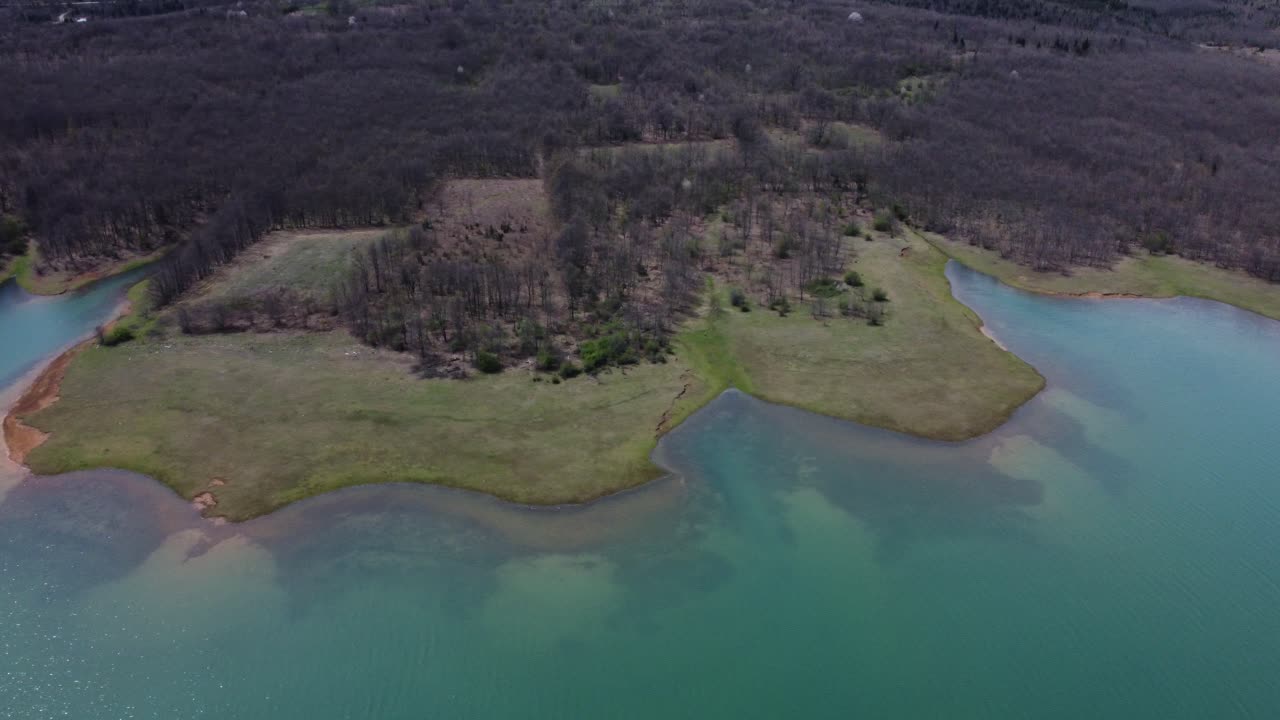Flying over lake Plastira's unique shoreline