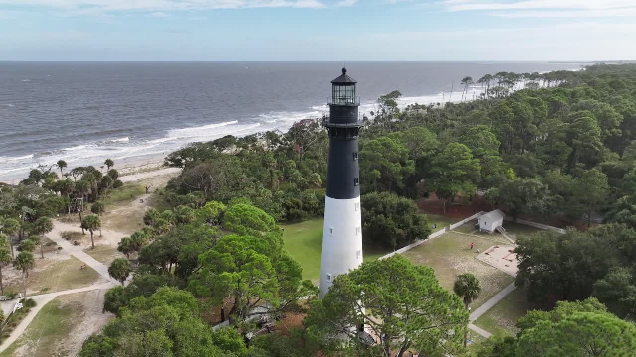 aerial orbit hunting island beach lighthouse in south carolina near beaufort