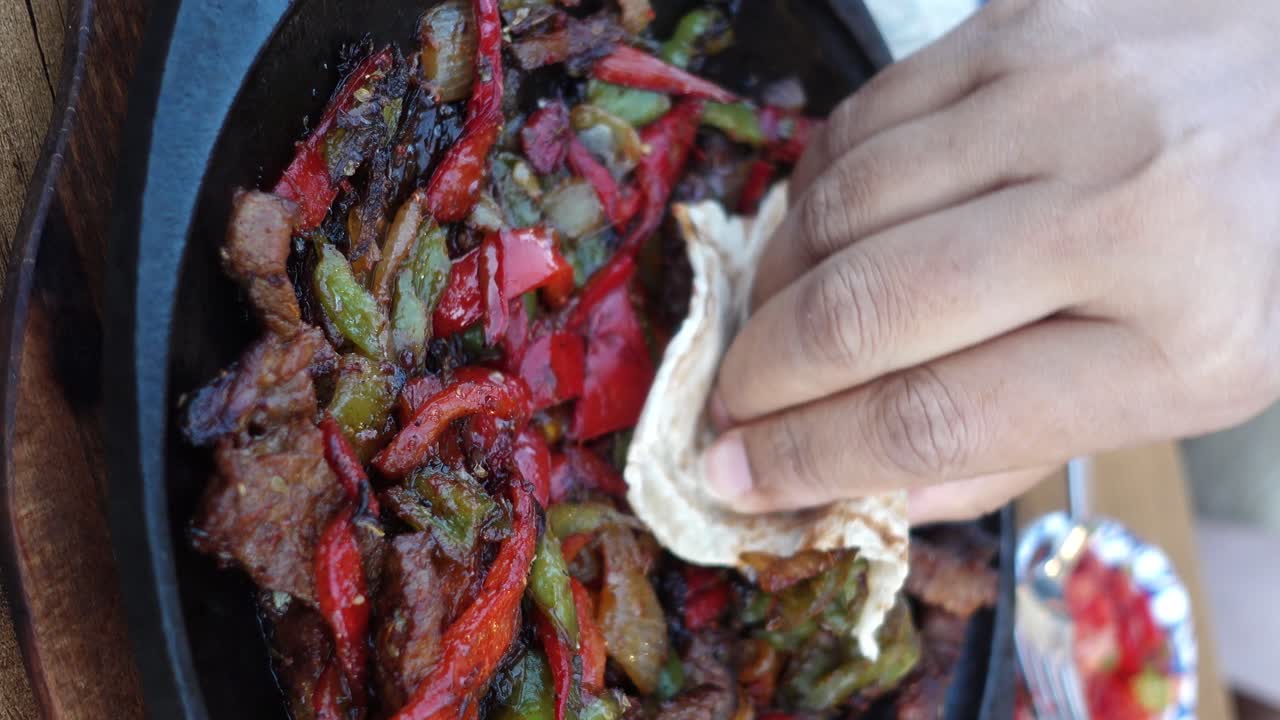 Delicious Fajitas being Eaten
