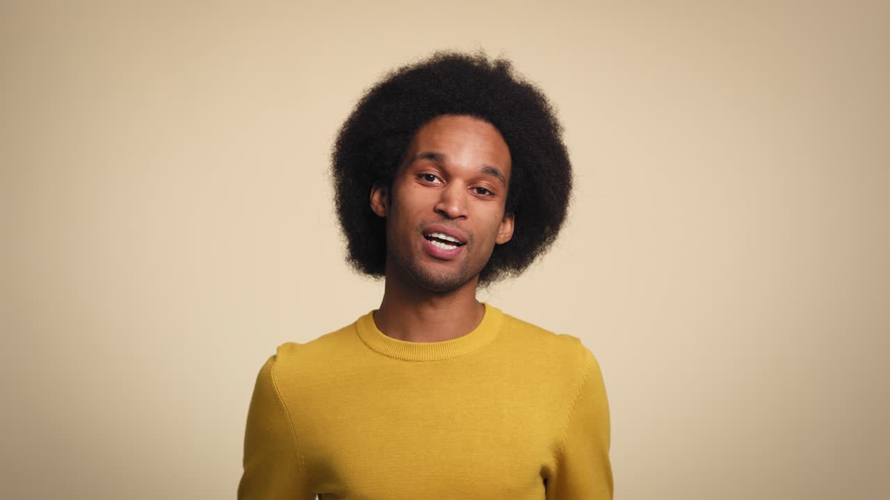 Video of young African man talking and gesturing