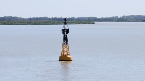 buoy floating in calm water near blaye, france