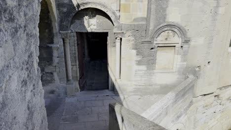 Entrance-to-the-chapel-on-the-bridge-in-Avignon-in-France,-historical-bridge-building,-old-wooden-door-to-Kelin-stone-chapel