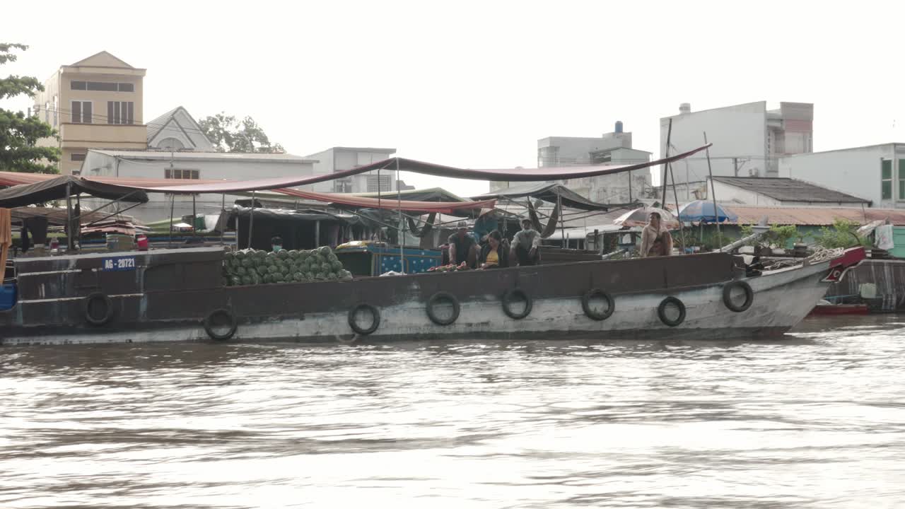 Local vendor boat sailing Cai Rang floating market, Can Tho, Vietnam
