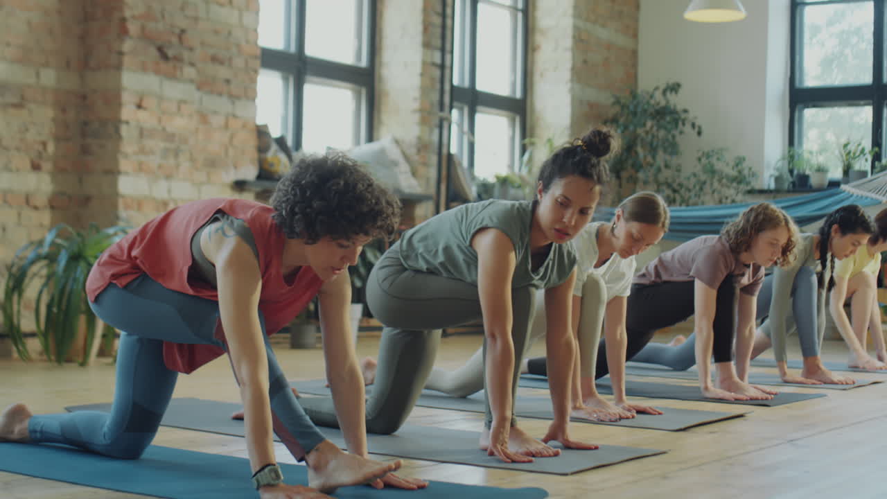 Women Stretching during Yoga Practice