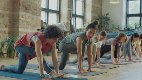women stretching during yoga practice