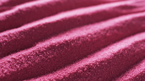 close-up of a textured pink fabric with a ribbed pattern