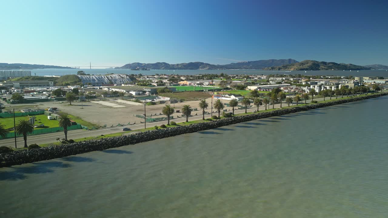Pan drone shot of Treasure Island in the day with Pacific Ocean in California, USA