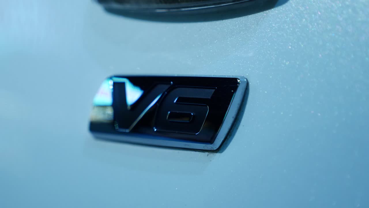 Close-up of a V6 Engine Emblem