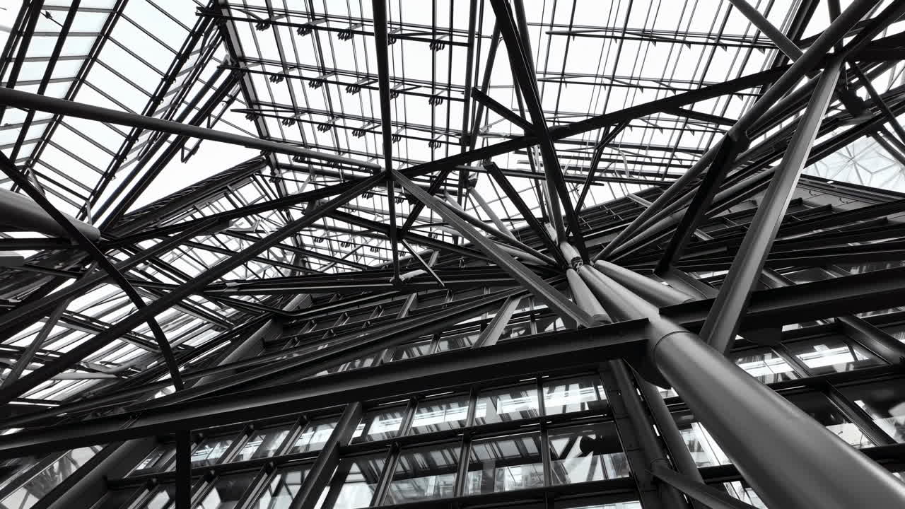Low Angle View of Modern Building's Geometric Glass and Metal Structure