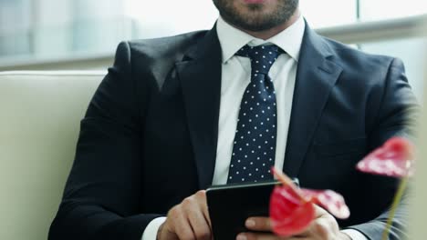 portrait middle eastern business traveller wireless cloud device