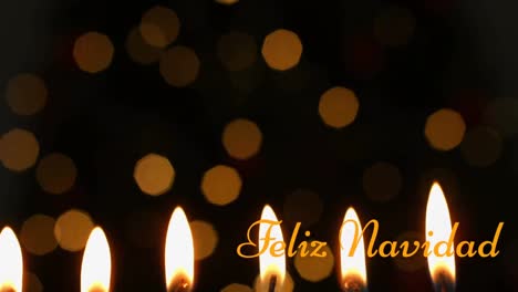 animación de texto de feliz navidad sobre velas