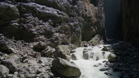 Perfect-Cinematic-Angle-Of-Water-Flowing-In-Cave-|-Grindelwald-Switzerland-Cave-in-Glacier-Canyon,-Europe,-4k