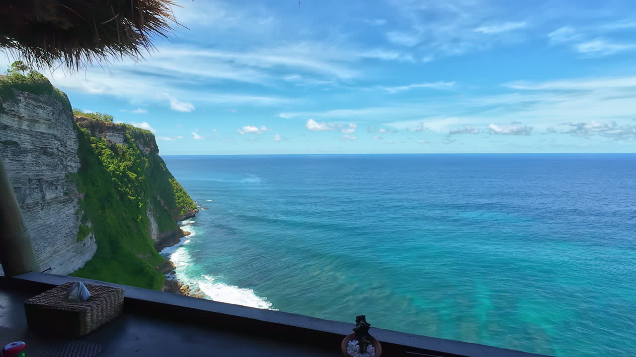 A beautiful restaurant overlooking the coastline and ocean near Pura Luhur, perfect for scenic dining.