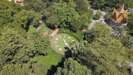 4K DRONE THE GIANT CLOCK OF PHNOM PENH AT WAT PHNOM TEMPLE, CAMBODIA