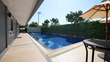 peaceful and sunny swimming pool area