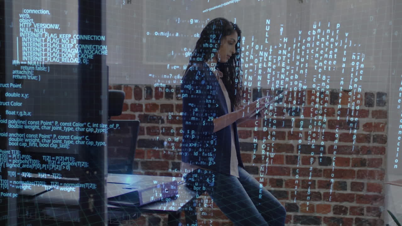 procesamiento de datos contra el retrato de una mujer india usando una tableta digital en la oficina