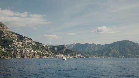 catamaran sailboat and mountainous surroundings on the amalfi coast in italy