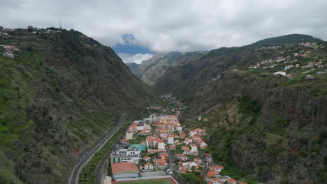 Aerial-of-valley-town-Ribeira-Brava-on-volcanic-island-of-Madeira