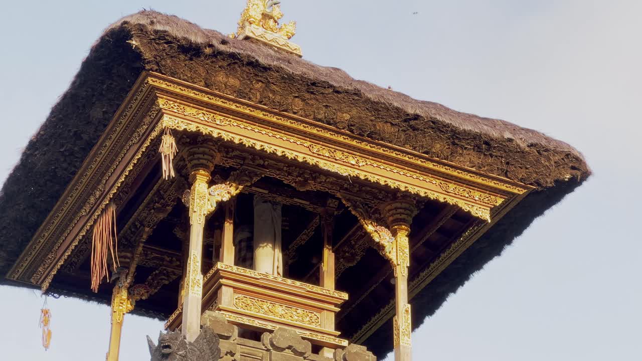 Explore a sacred Bali Hindu temple where the gate tower and carved wood details highlight devotion, artistry, and spirituality, offering a glimpse into Bali’s rich cultural and religious history