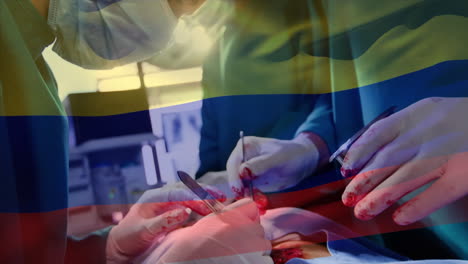 animación de la bandera de colombia sobre los cirujanos en la sala de operaciones