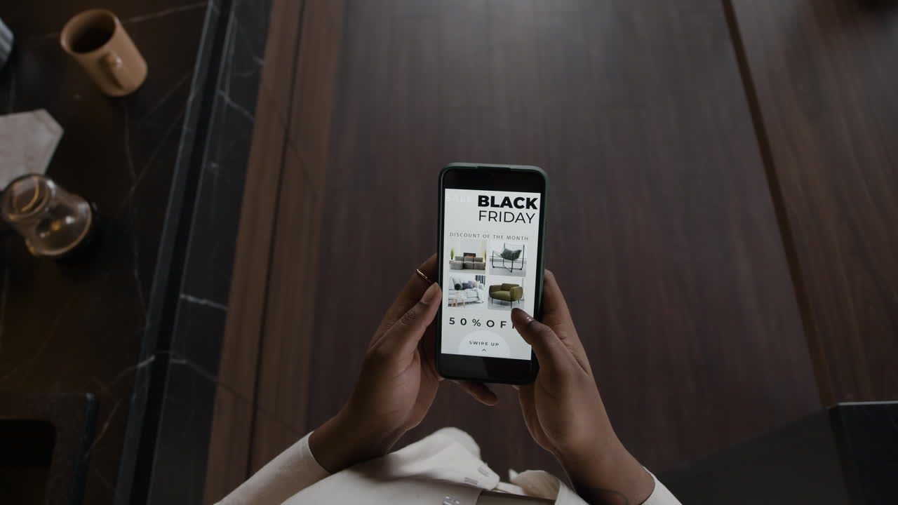 Shopping online with Black Friday sales on mobile phone