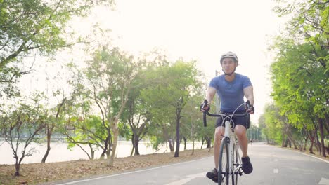 man cycling in a park