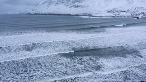 arctic ocean waves in winter, olafsfjordur, north iceland