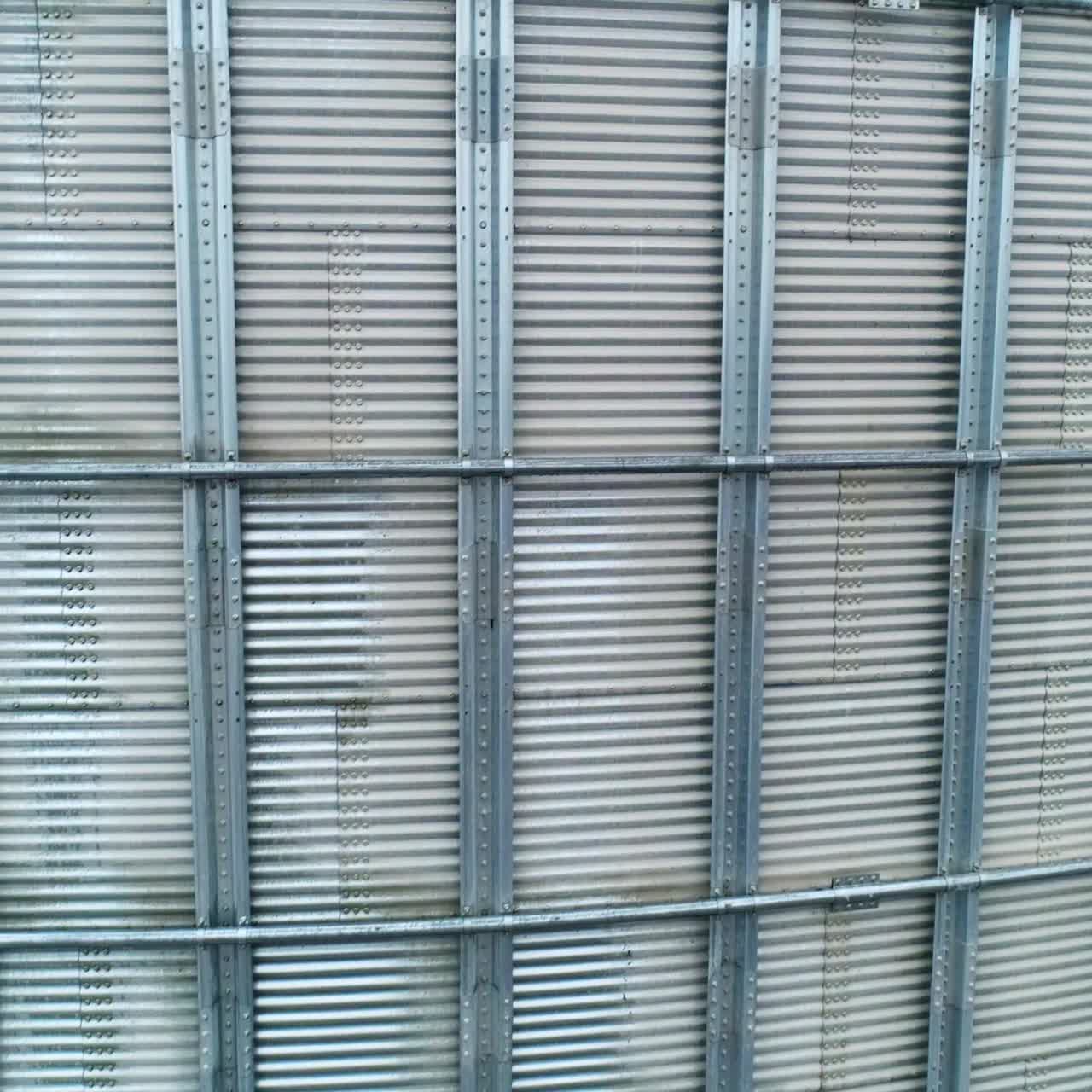 Big farming elevator storage. Factory big metal modern silos