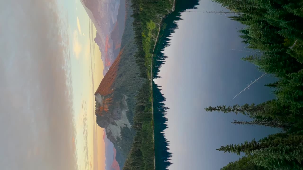 Vertical video, Mount Rainier and the Summit lake cinematic shot sunset, Tahobet is a large active stratovolcano in the Cascade Range, located in Mount Rainier National park