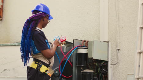 engineer calibrating manifold gauges