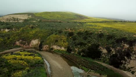 Zooming-over-Elevated-Train-Platform-showing-Mountainside