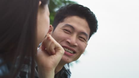 handheld view of vietnamese tourist couple looking at view