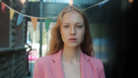 Woman in Pink Blazer