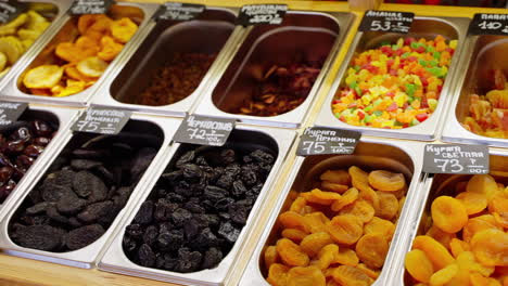 dried fruit and candied fruit display at a market