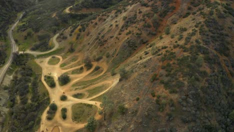 beautiful 4k aerial footage of dirt bikes, atvs and quads in desert mountains of california. atv trails and gorgeous golden mountains. this is one clip of 11 in the series.