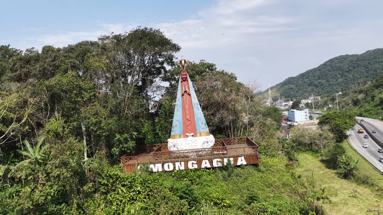 Religious Symbol Of Mongagua In Sao Paulo Brazil. Religious Skyline. Downtown Cityscape. Our Lady Of Aparecida Saint. Religious Symbol At Mongagua In Sao Paulo Brazil. Patron Saint Hill