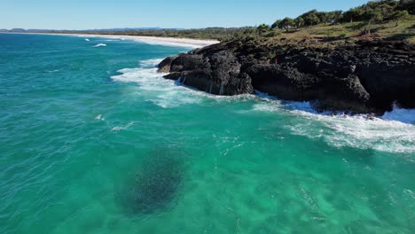 fingal headland with waves splashing