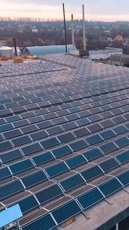 Solar electric power from above. Aerial view of solar energy on rooftop