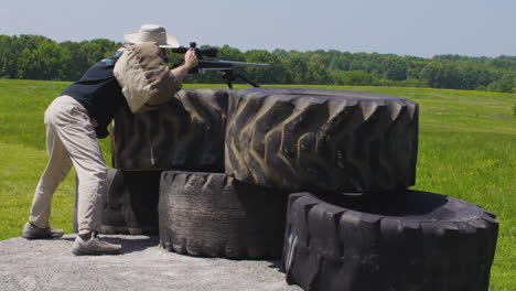 marksman with precision rifle at shooting competition in leach, oklahoma