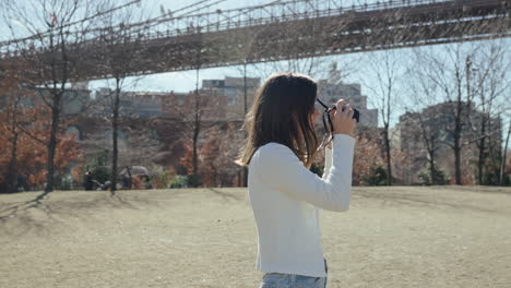 woman taking photo in new york city