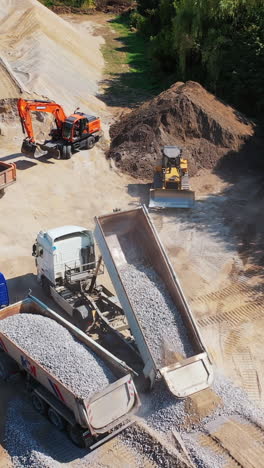 arial view of construction site. aerial view of highway road construction vertical video