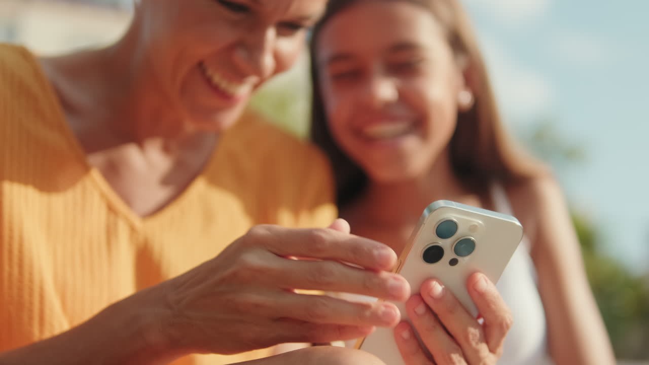 Mother and Daughter Share a Special Moment in the Park