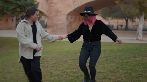 two women enjoying time in a park